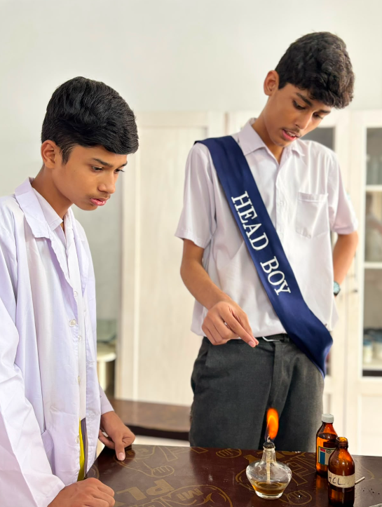 Warsis Secondary students carrying out a chemistry practical in the school laboratory